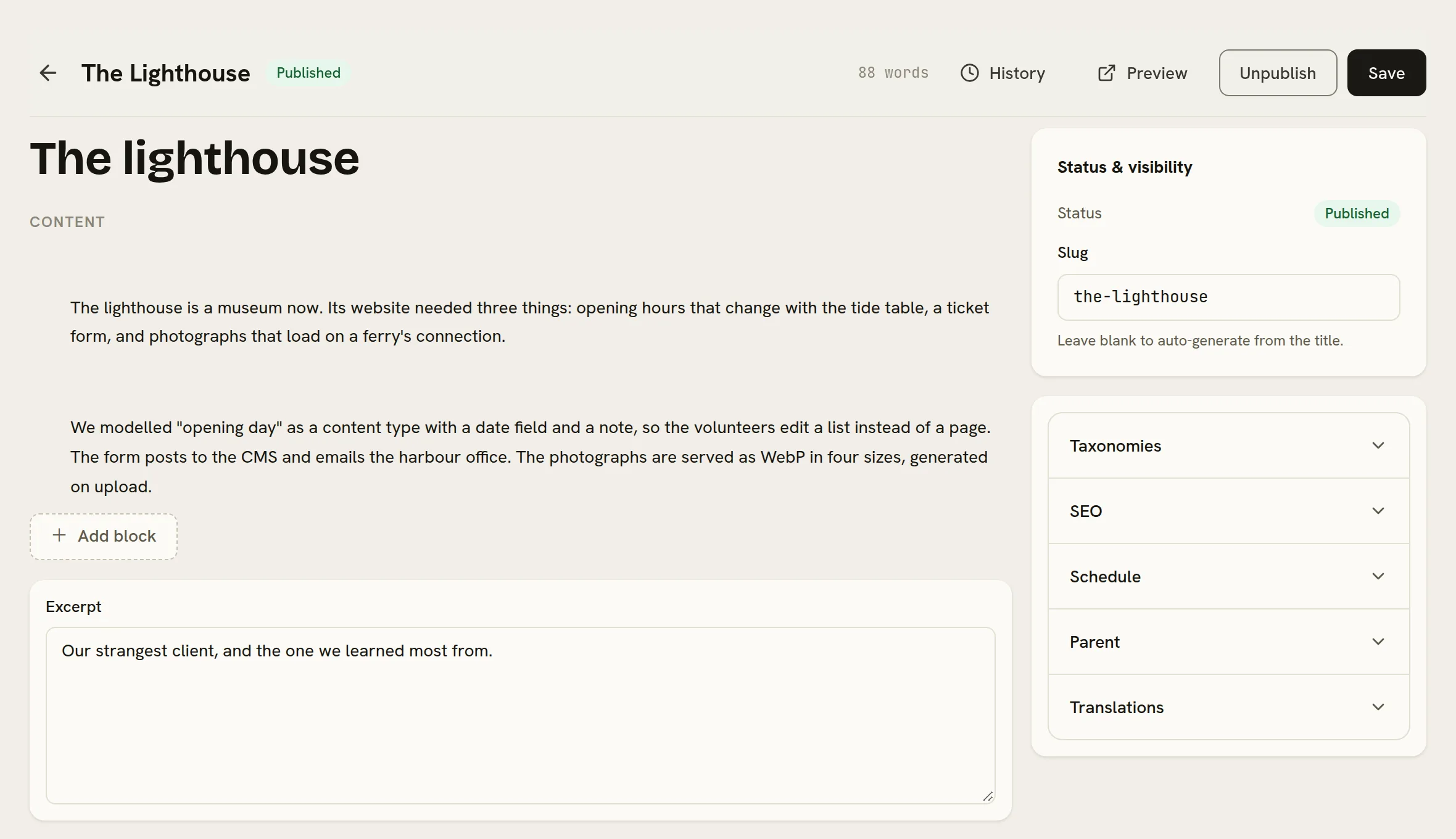 Editing the post The lighthouse: two content blocks, the excerpt, and the status, slug, taxonomies, SEO, schedule, parent and translations panels