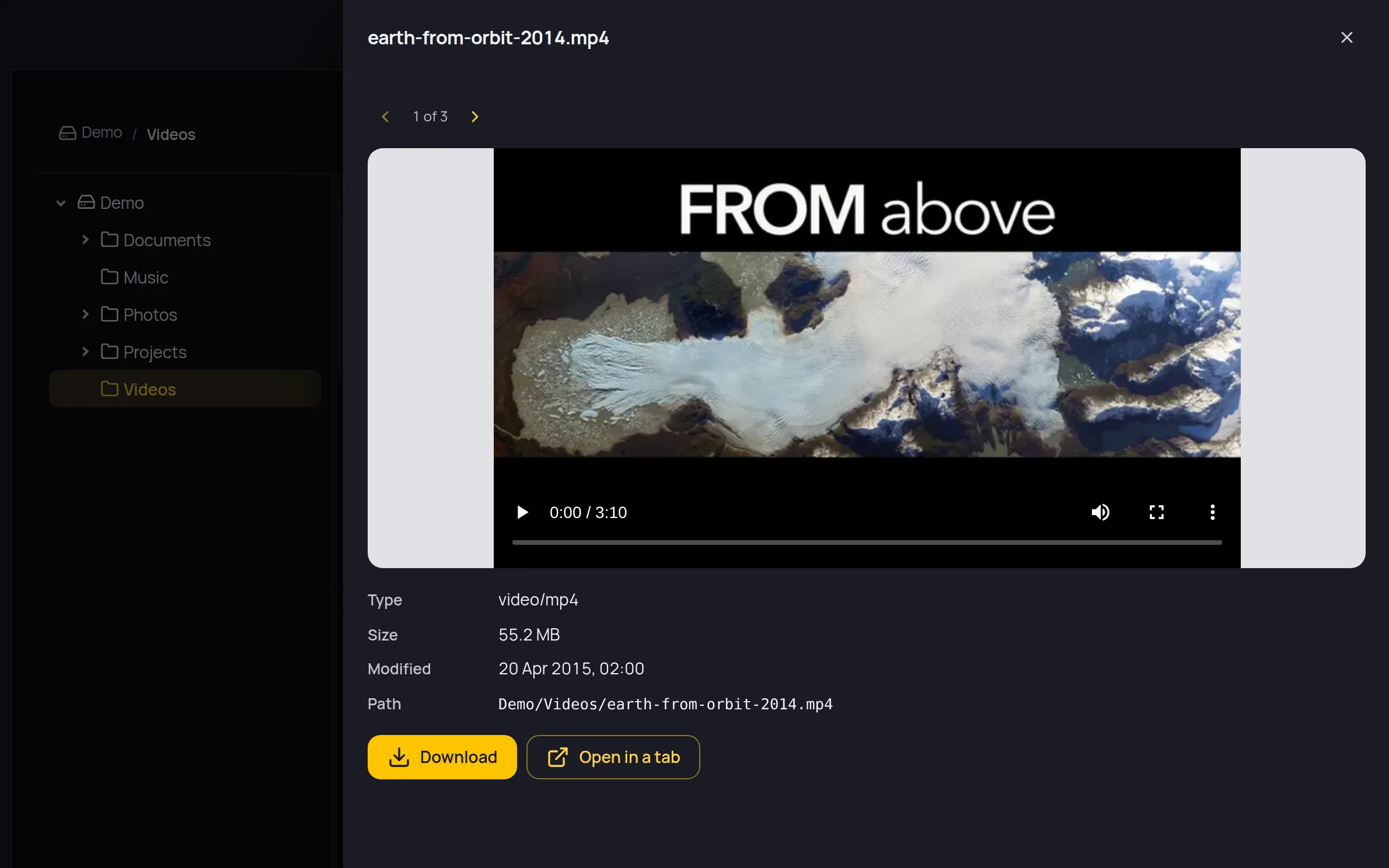 The preview drawer playing a NASA video, with its type, size, date and path, and buttons to download it or open it in a tab